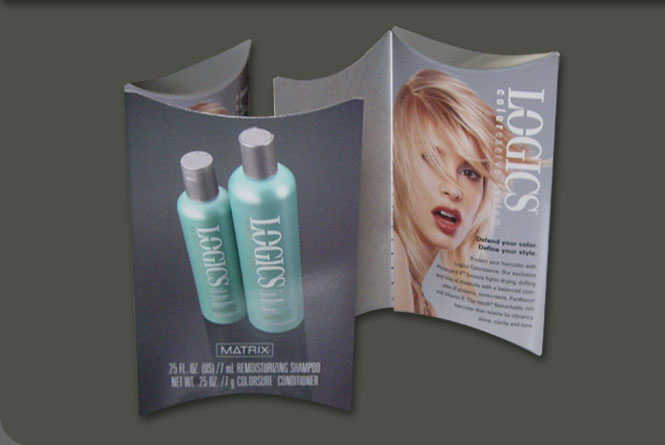 JCPenney salon
promotional carton for Logics shampoo and conditioner sample packettes